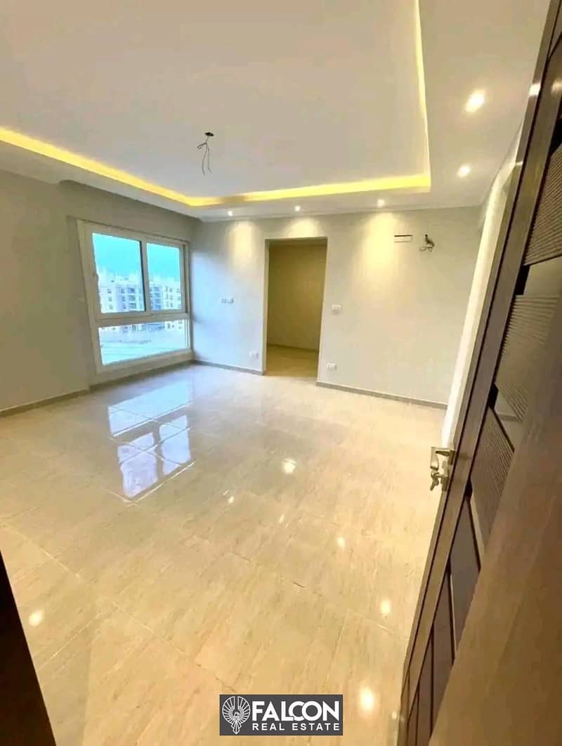 Two-bedroom apartment with a fantastic view and location, immediate delivery, for sale, High End finishing, in Fustat "Arabesque", with a 10% down pay 2