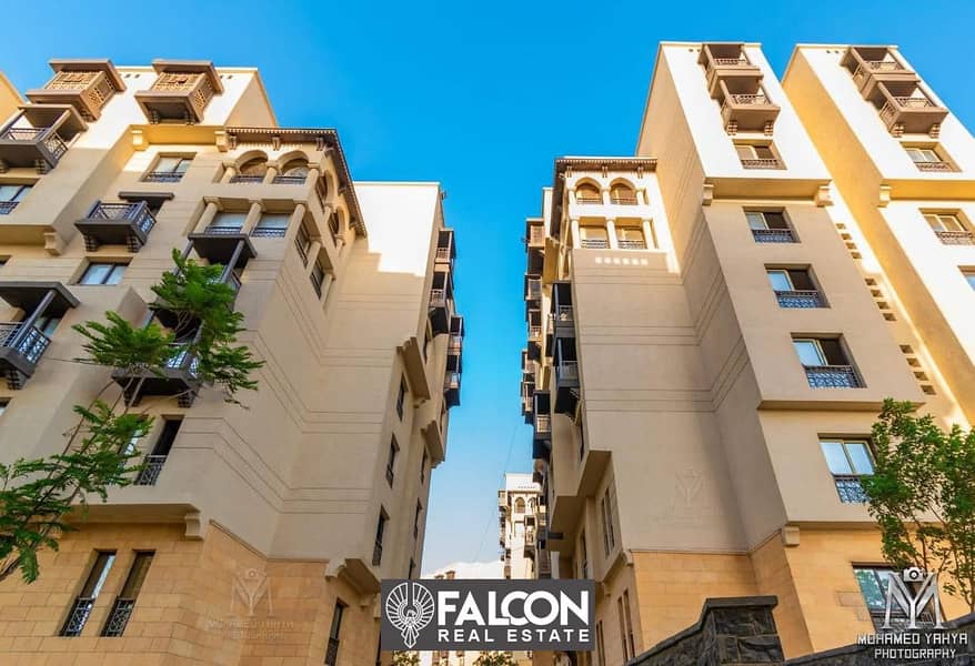 Two-bedroom apartment with a fantastic view and location, immediate delivery, for sale, High End finishing, in Fustat "Arabesque", with a 10% down pay 6