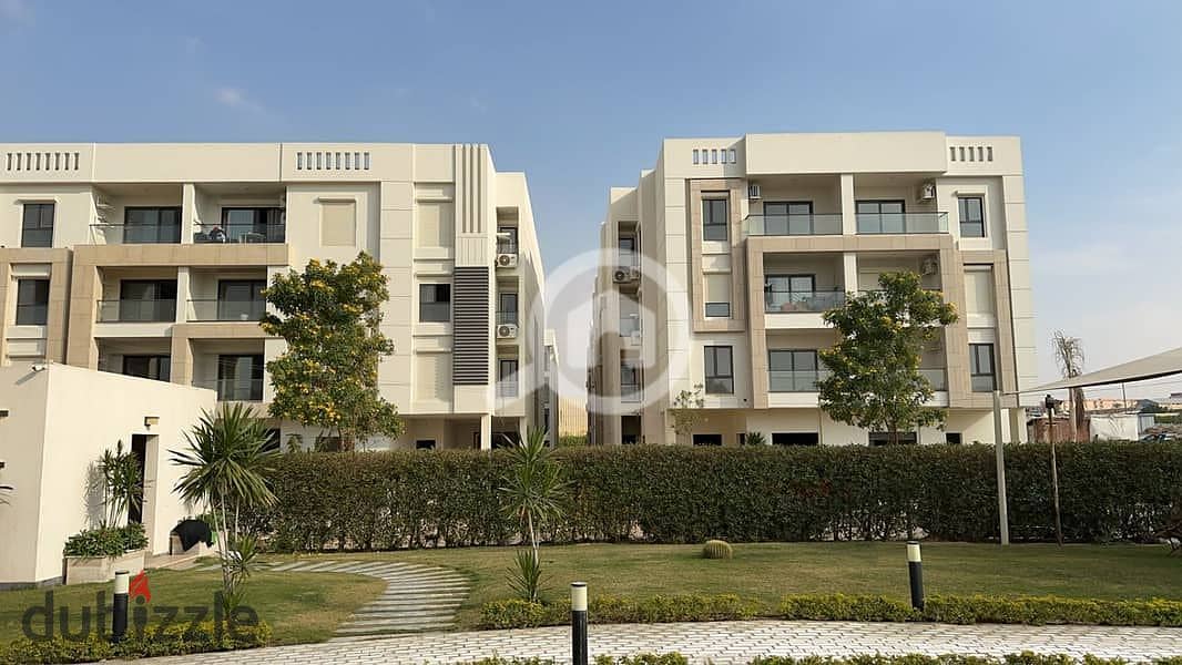 With air conditioning and a fully finished kitchen, a 3-room apartment for sale in a compound near the airport and at the entrance to the Fifth Settle 7