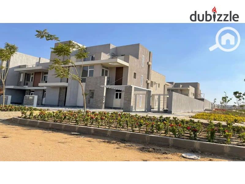 Townhouse for sale fully finished with a large garden view with a down payment and installments in Al Maqsad Compound 1