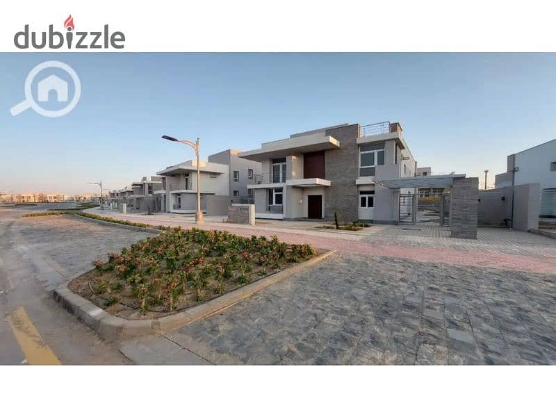 Townhouse for sale fully finished with a large garden view with a down payment and installments in Al Maqsad Compound 2