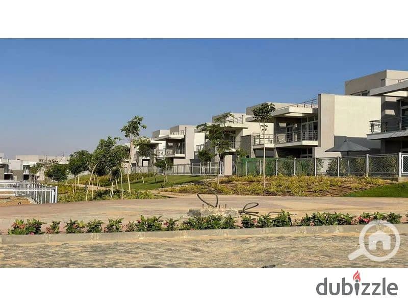 Townhouse for sale fully finished with a large garden view with a down payment and installments in Al Maqsad Compound 4