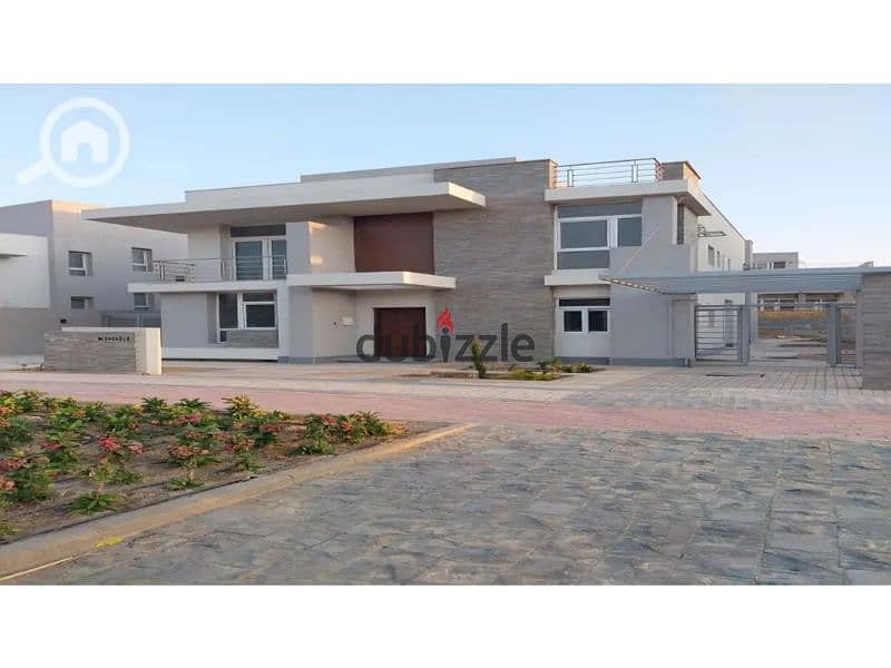 Townhouse for sale fully finished with a large garden view with a down payment and installments in Al Maqsad Compound 5