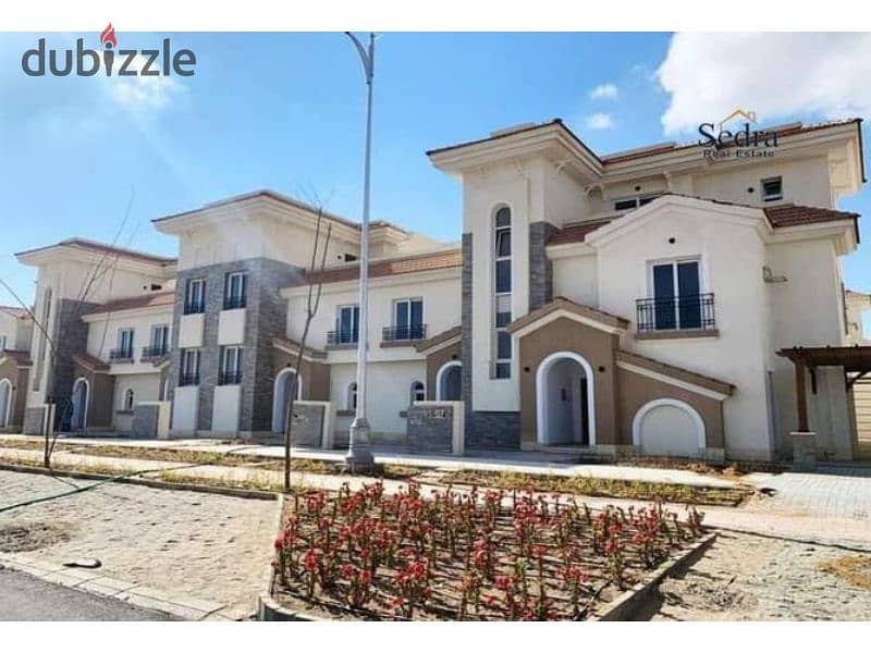 Townhouse for sale fully finished with a large garden view with a down payment and installments in Al Maqsad Compound 7