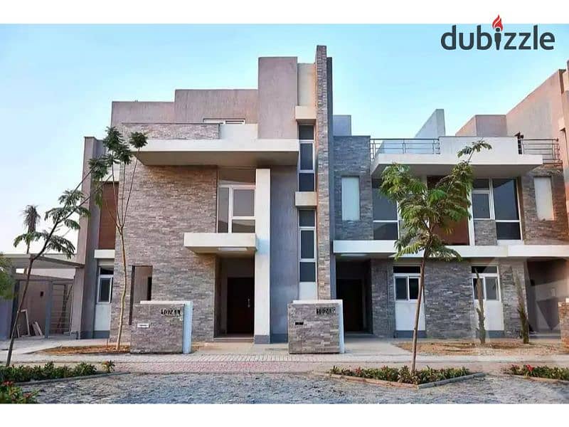 Townhouse for sale fully finished with a large garden view with a down payment and installments in Al Maqsad Compound 9