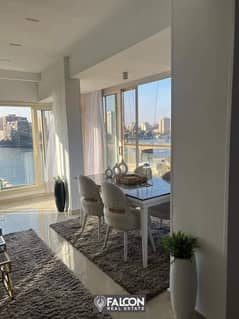 Double view on Nile and pyramids an apartment for sale with hotel furnishings and appliances in Prime location in Maadi Reve du Nil next to Hillton 0