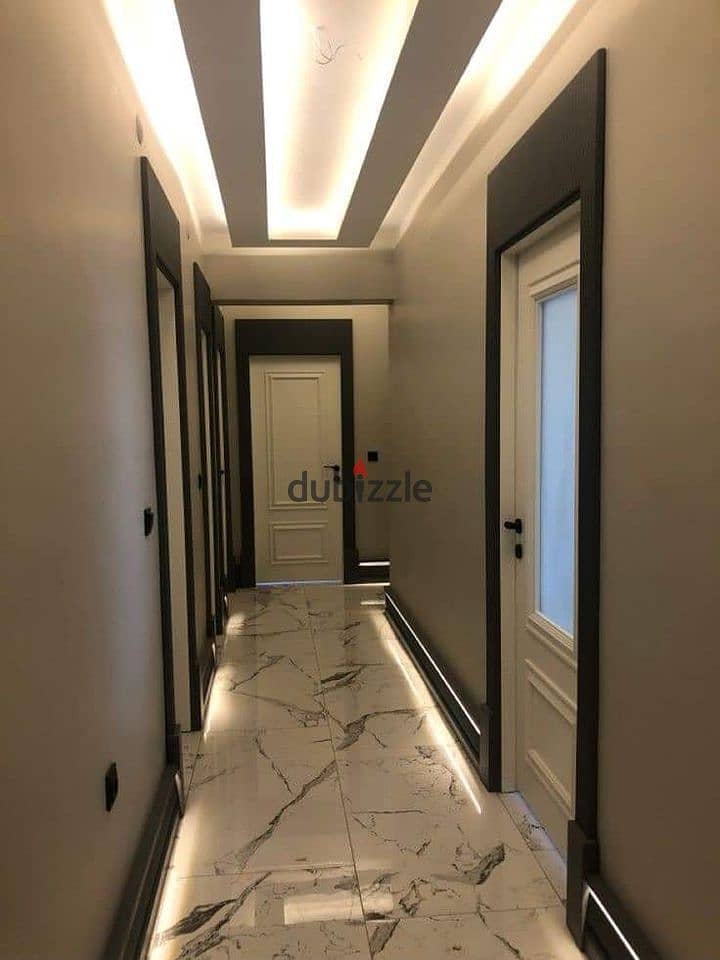 Apartment for sale, fully finished, with kitchen and air conditioners, in Sheraton, directly next to Almaza City Center and minutes from Cairo 5