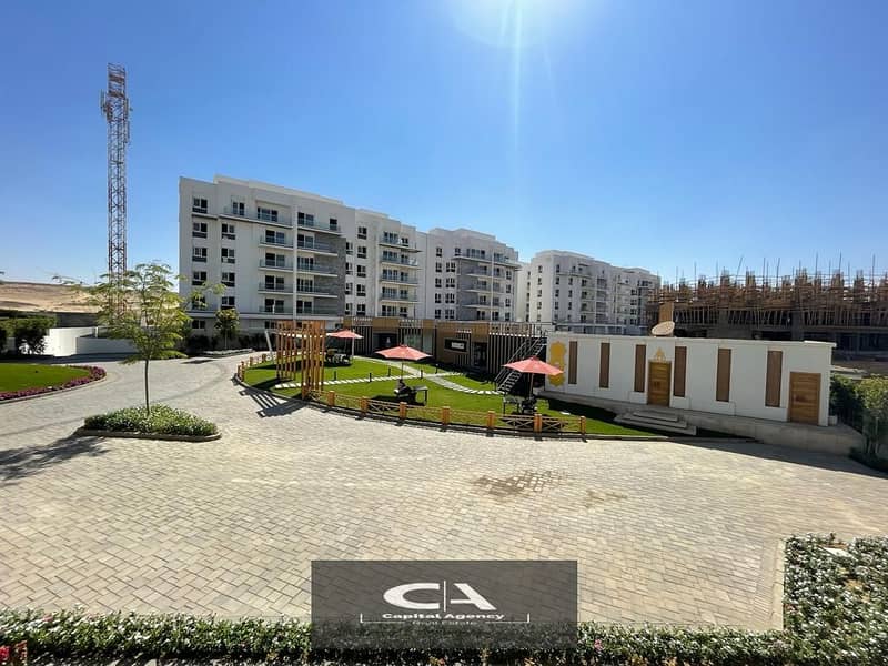 own an apartment with immediate receipt in Mountain View iCity Compound, New Cairo View on the lagoon with only 10% down payment * Mountain View I Cit 27