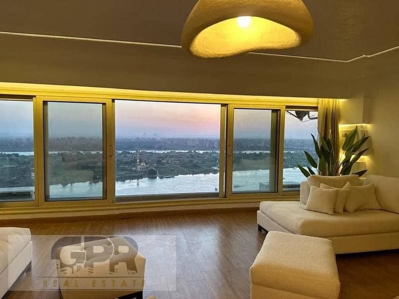 fully furinished studio apartment with nile view in reve du nil tower / أكبر عائد بالدولار على كورنيش النيل شقة فندقية استلام فوري متاحة للمعاينه 0