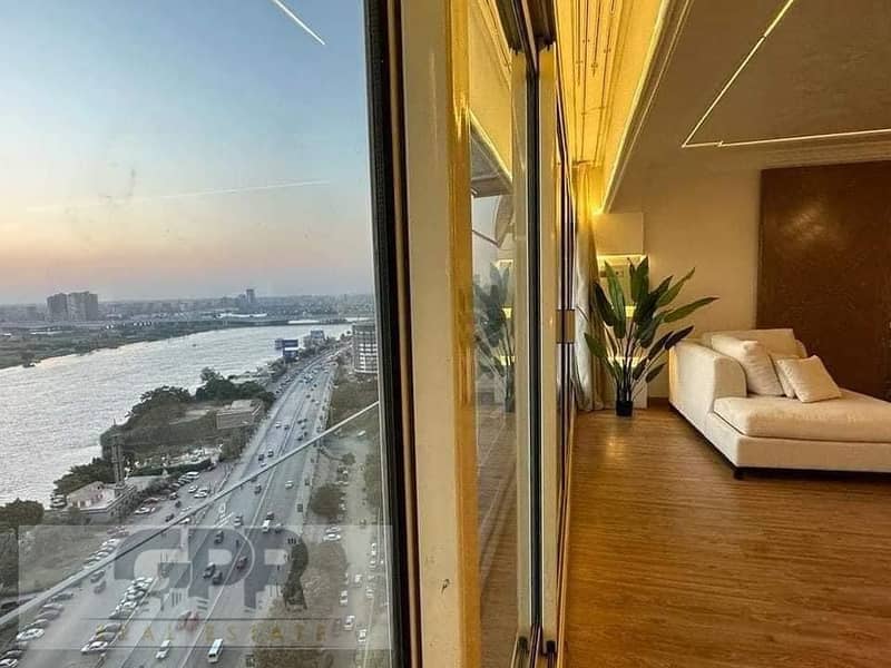 fully furinished studio apartment with nile view in reve du nil tower / أكبر عائد بالدولار على كورنيش النيل شقة فندقية استلام فوري متاحة للمعاينه 5