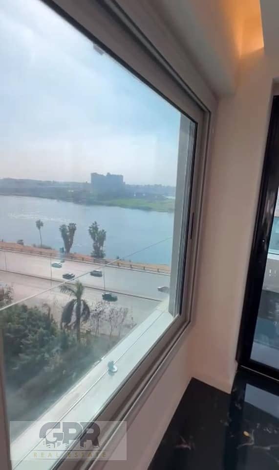 fully furinished studio apartment with nile view in reve du nil tower / أكبر عائد بالدولار على كورنيش النيل شقة فندقية استلام فوري متاحة للمعاينه 14