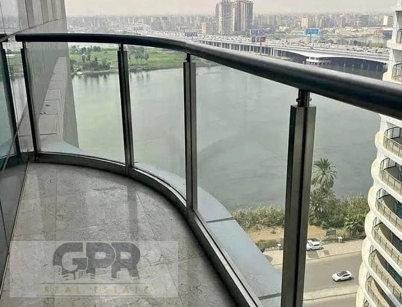 fully furinished studio apartment with nile view in reve du nil tower / أكبر عائد بالدولار على كورنيش النيل شقة فندقية استلام فوري متاحة للمعاينه 16