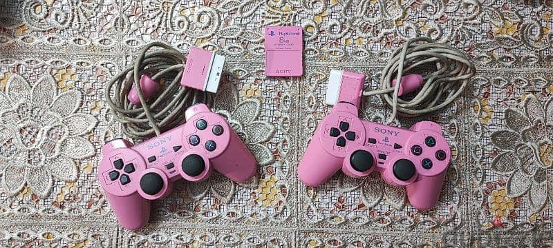 Playstation 2 Pink original controllers and original memory card 0