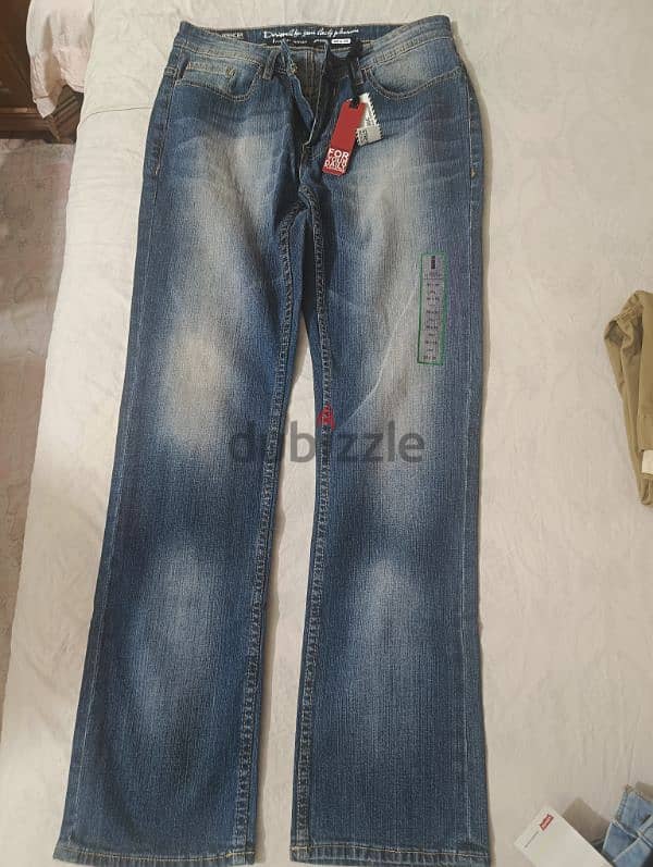 Spencer Slim Jeans 30x32 من خارج مصر 0