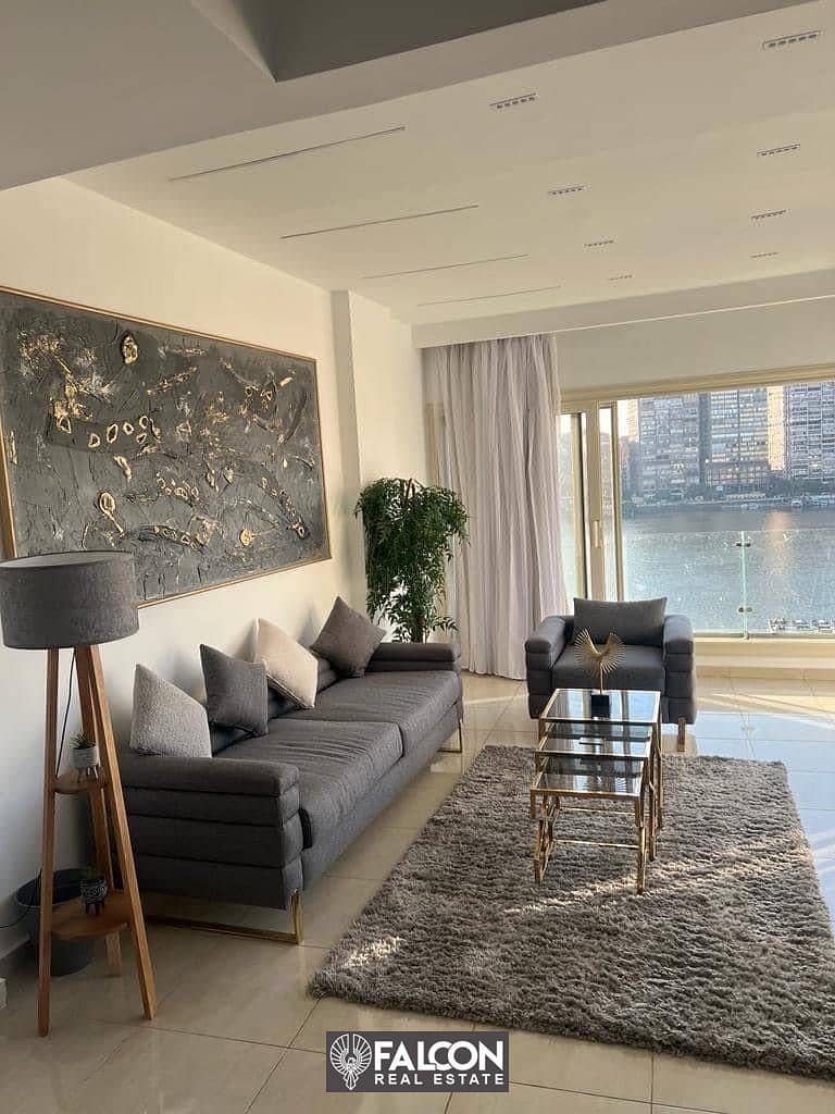 Apartment for sale on the Nile, 100 m, with furnishings and air conditioners, immediate receipt, Reef du Nile, Maadi, prime location, installments for 8