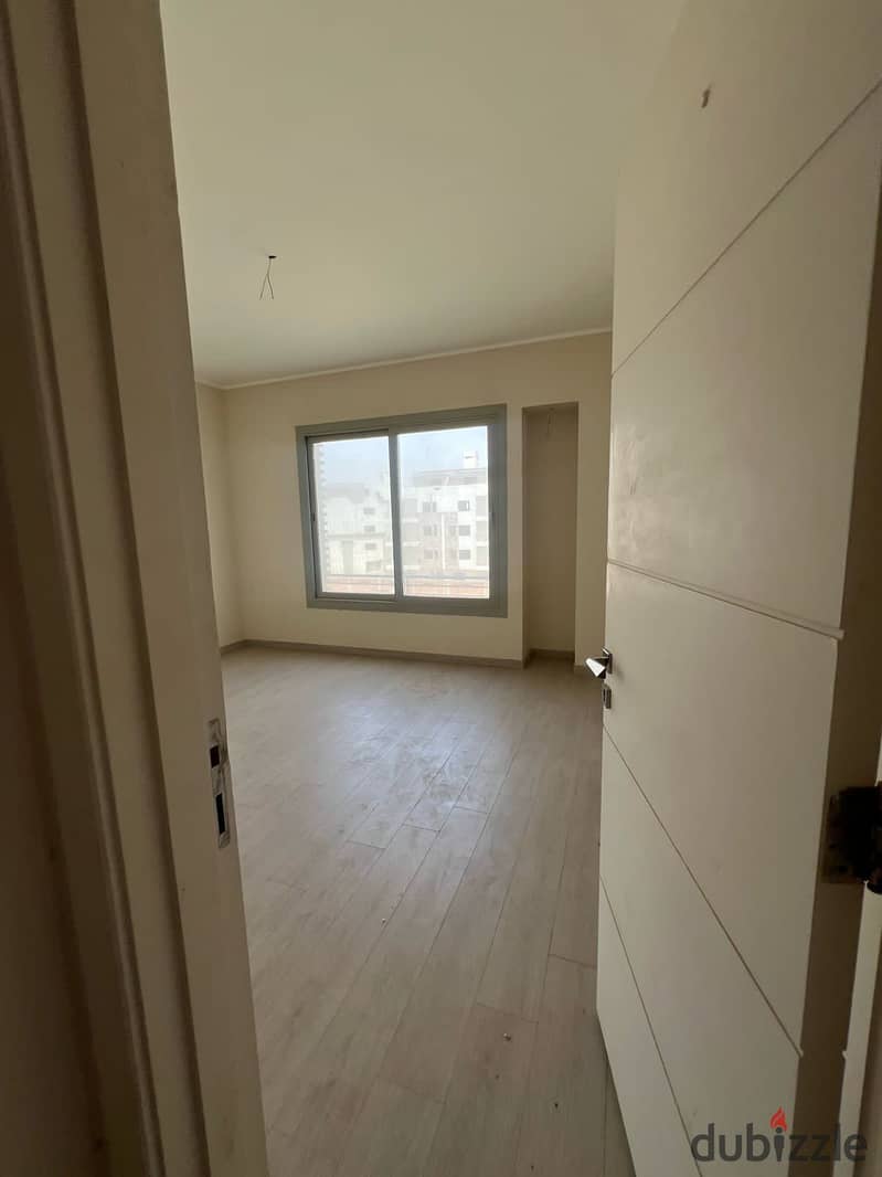 Studio for rent in Village Gate / Palm Hils ( Kitchen cabinets appliances , AC's and  Garage ) Fifth Settlement - New Cairo 1