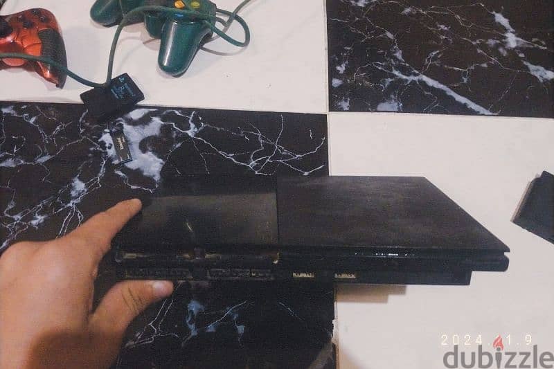 PS2 (بلايستيشن 2 ) يعمل في حاله ممتازة مع أكثر من ٤٠ لعبه 0