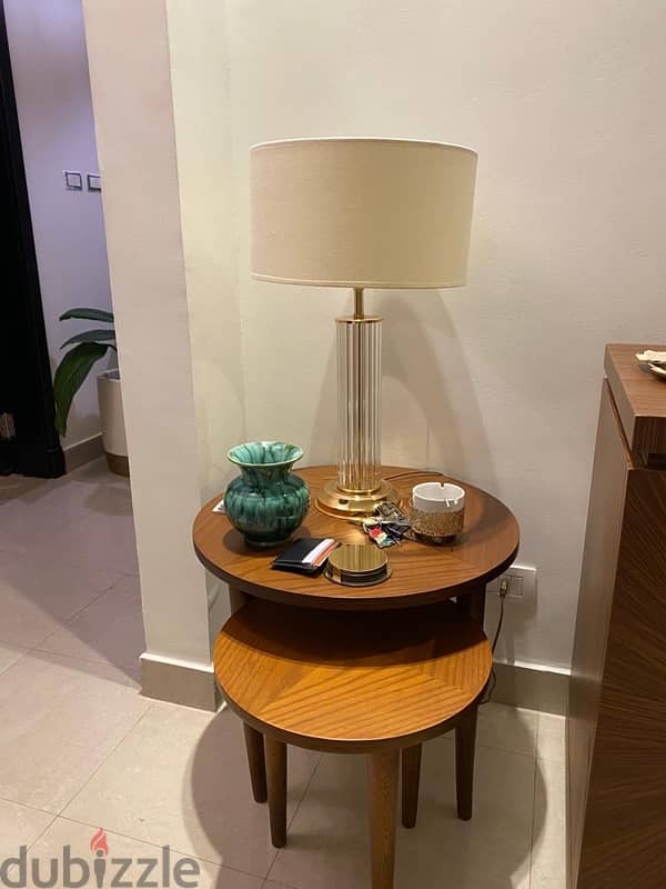 serving table and a lamp 0