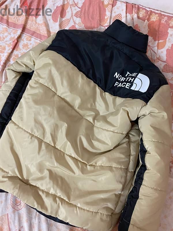 جاكت بامب the north face مقاس medium 1