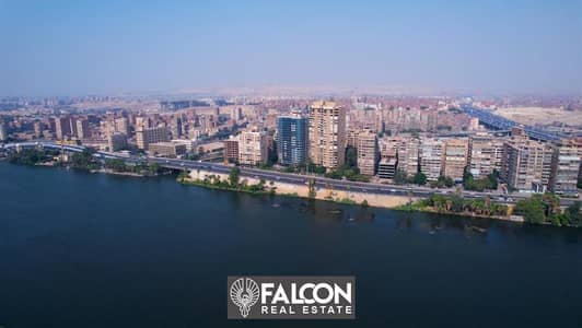 Distinctive hotel studio for sale in Reef du Nile Tower in Maadi, direct view of the Nile, in interest-free installments