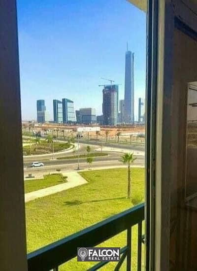 Double view of iconic tower and garden Ready To Move a finished apartment with installments up to 10 years in Al Maqsad Compound in New Capital