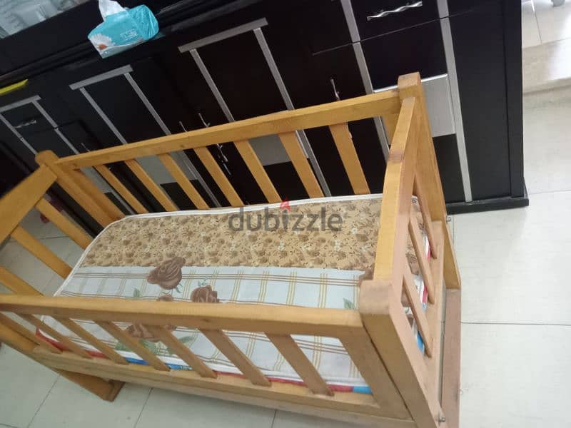 Baby wooden bed سرير بيبي 1