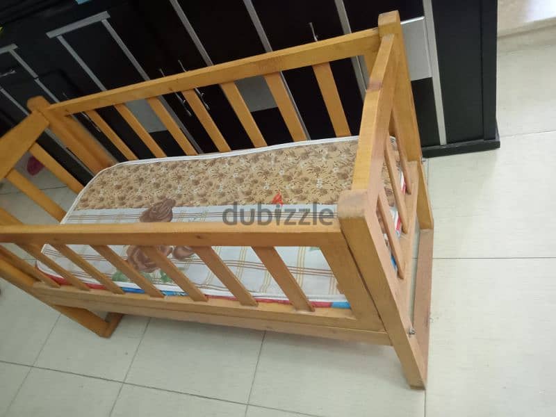 Baby wooden bed سرير بيبي 2