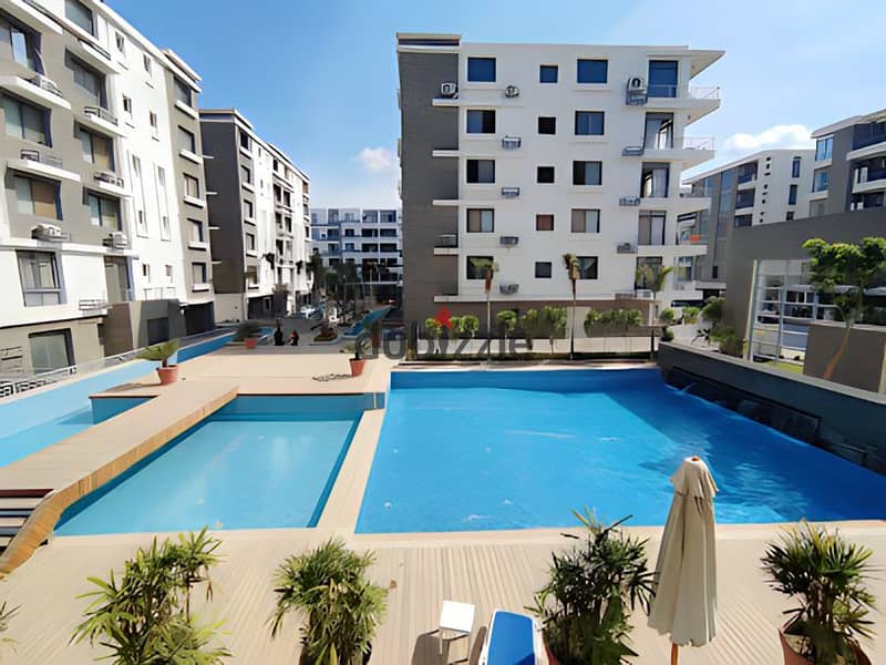 Apartment for sale in installments in the Fifth Settlement in a compound with full services and facilities, security guards and surveillance cameras . 4