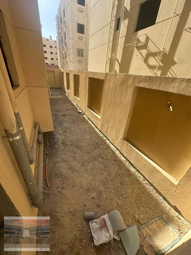 Apartment ground floor with garden for sale in Al narges 12