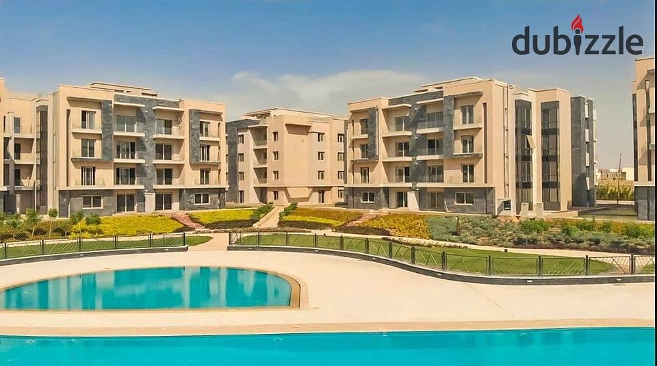 A ready-to-move-in apartment for sale, located near the American University in Cairo (AUC), in Galleria Moon Valley Compound, Fifth Settlement. 2