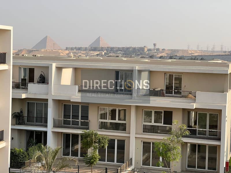 In front of Giza Plateau, a fully finished apartment + ACs in Pyramids Hills 6th of October, Ora Naguib Sawiris, in front of New Giza 9