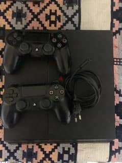 PlayStation 4 Fat 500 gb with 2 controllers 0