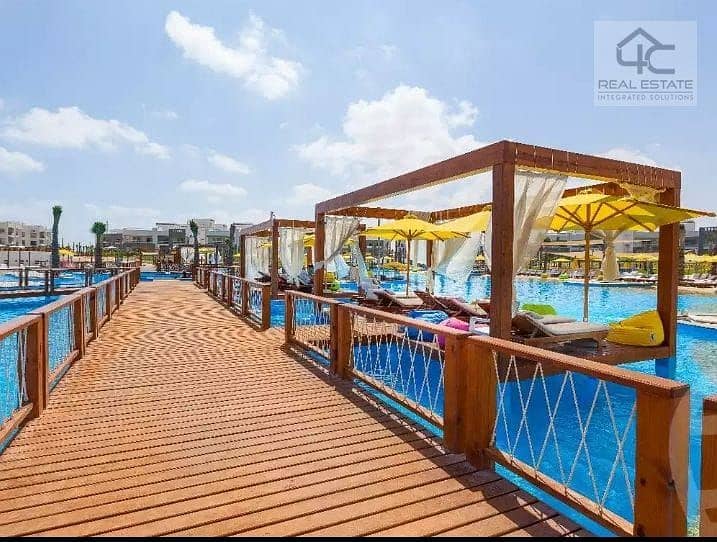 chalet 115 m at lowest price for sale in amwaj north coast view pool and landscape 3