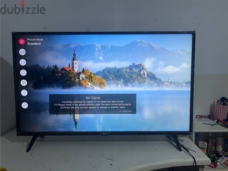 UHD LG TV in a perfect condition with a smart remote 12