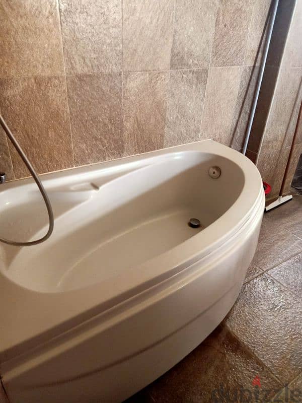 ideal standard shower bath 1