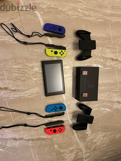 Nintendo Switch 4 Controllers 2 Games