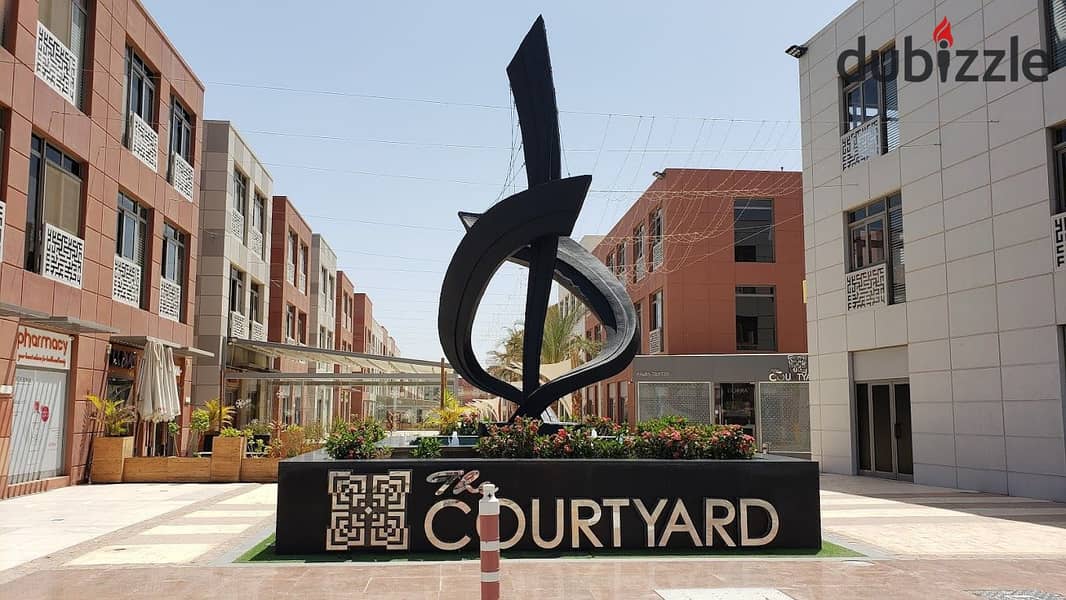 Office for rent, administrative headquarters, 515 square meters, fully finished, furnished, and air conditioners, The Courtyard, Sheikh Zayed, near th 11