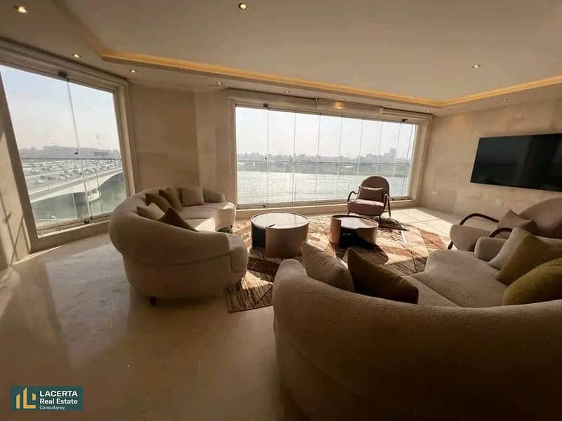 Hotel apartment for sale, 92 square meters, direct view of the Nile, immediate receipt, 5-year installments, Reef du Nile, Maadi 2