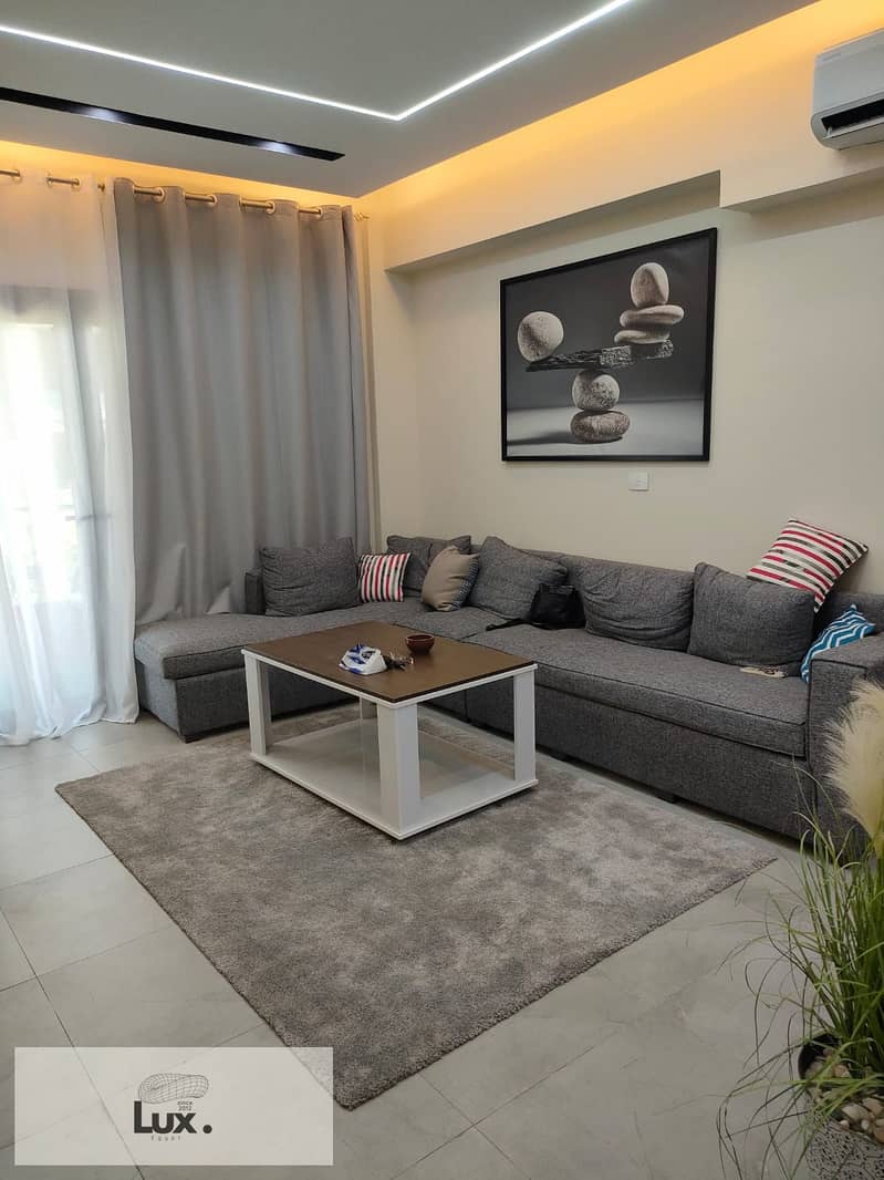 Apartment for rent, furnished, for housing lovers in Privado, Madinaty, area 84 m, super deluxe finishing, fully air-conditioned, with new furniture, 0