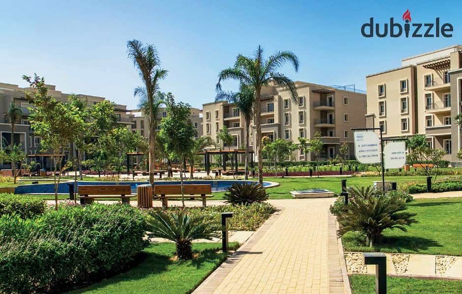 View and receive immediately an apartment with a garden in SODIC October Plaza in installments, Prime Location in Sheikh Zayed 2