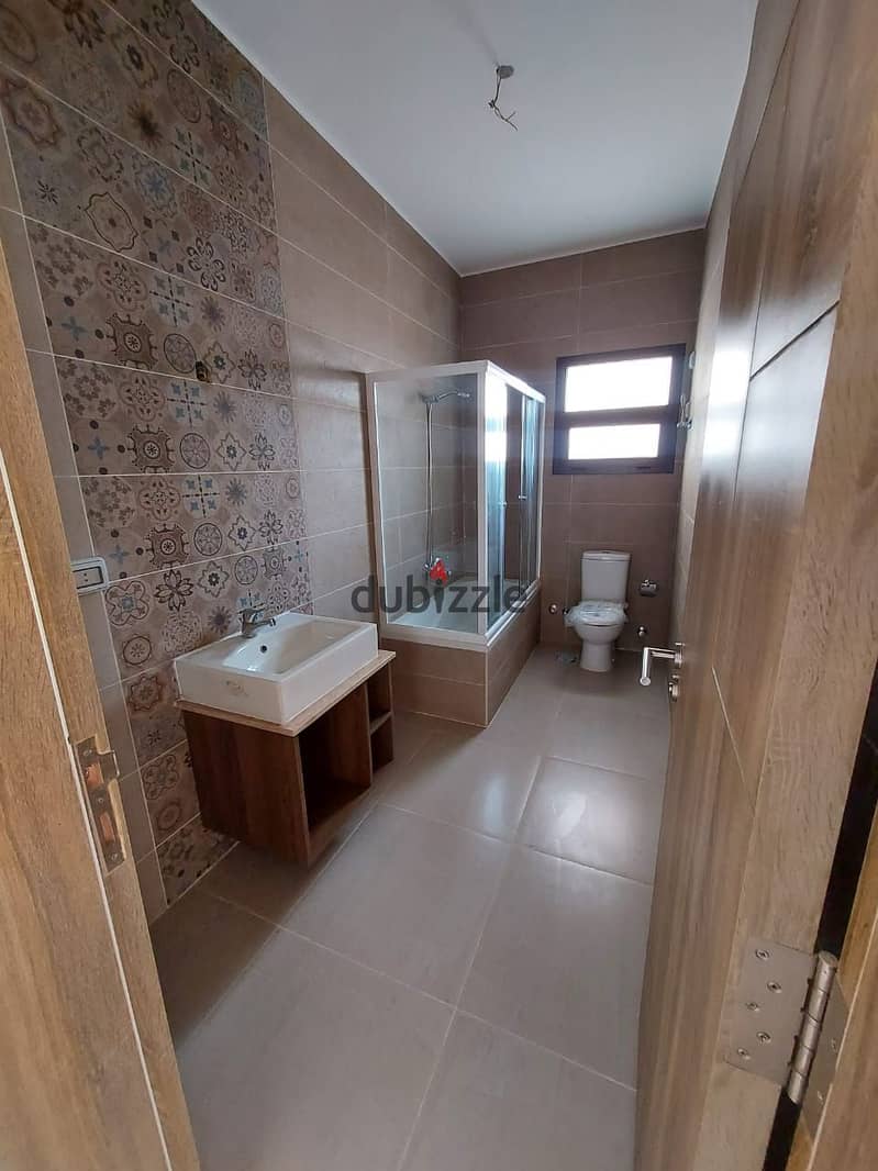 شقة بحديقه للايجار نص فرش 2نوم بكمبوند فيفث سكوير المراسم التجمع Apartment rent Marasem 4