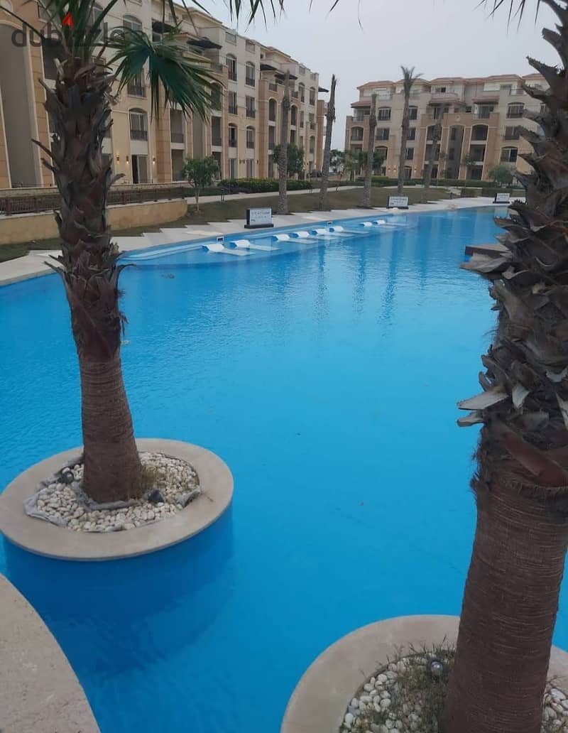 A 200 sqm apartment (4 rooms) for sale, ready for immediate delivery, in Stone Residence Compound, New Cairo (Fifth Settlement). 1