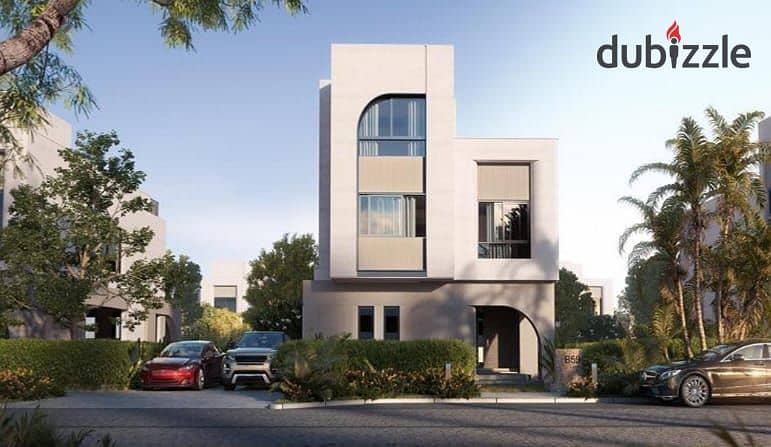 A townhouse for sale with installment options, located in front of Mall of Egypt, in O West by Orascom. 0