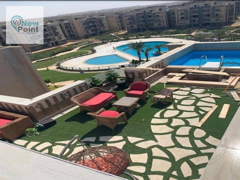 Receive immediately a 207 m penthouse + 120 m roof with a swimming pool next to AUC, Fifth Settlement 4