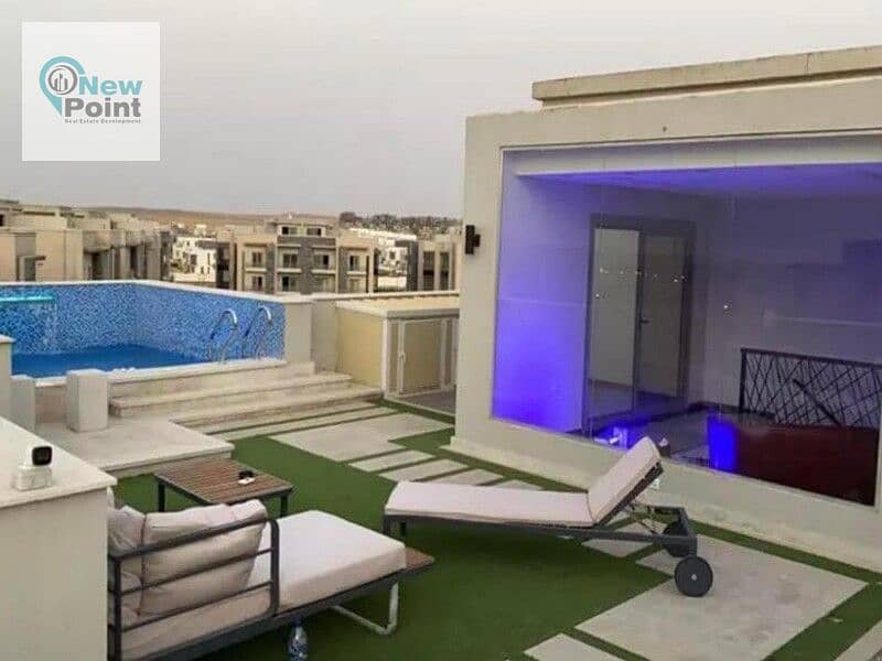 Receive immediately a penthouse with a roof of 161 m, with installments over 5 years, next to Palm Hills, New Cairo 4