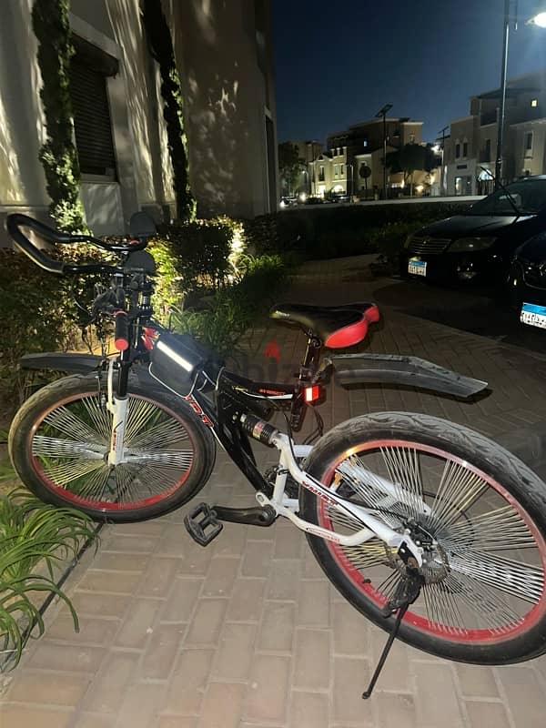 adult bicycle with 2 bags and drink holder 1