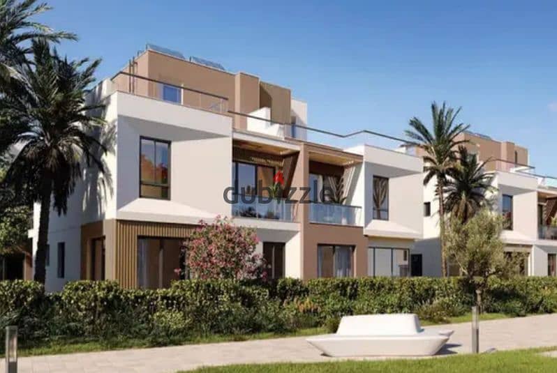 Townhouse at an attractive price in Sodic's VYE Compound in the heart of New Sheikh Zayed, with installment options. 0