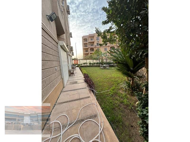 Ground apartment with garden -3 bedroom - Fully finished - in ACACIA compound - new Cairo 2