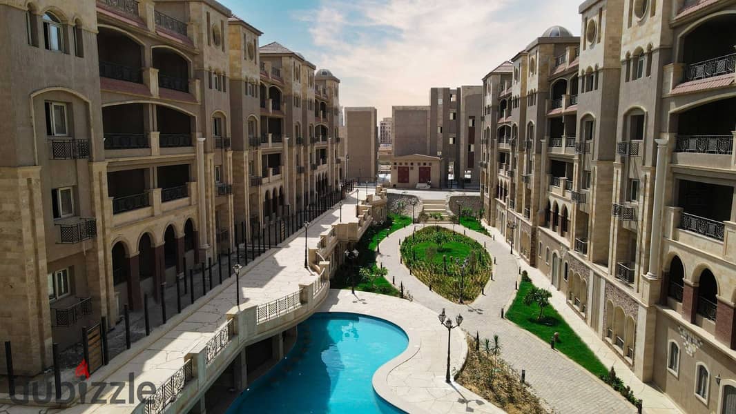 Resale apartment for sale in the Fifth Settlement with a view of the pool and landscape next to a commercial mall in Rock Vera Compound . . . . . | Mivida 0