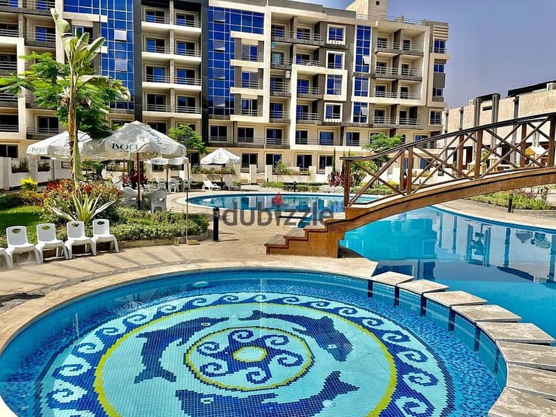 محل للبيع 36م فى شارع الصاعقة شيراتون قسط على 10 سنين بكمبوند isola sheraton 1